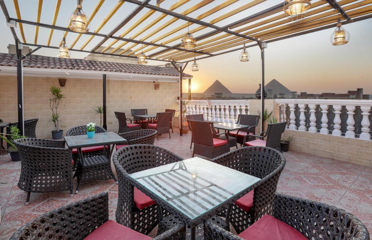 Pyramids Inn Hotel Kafret el-Gabal Esterno foto