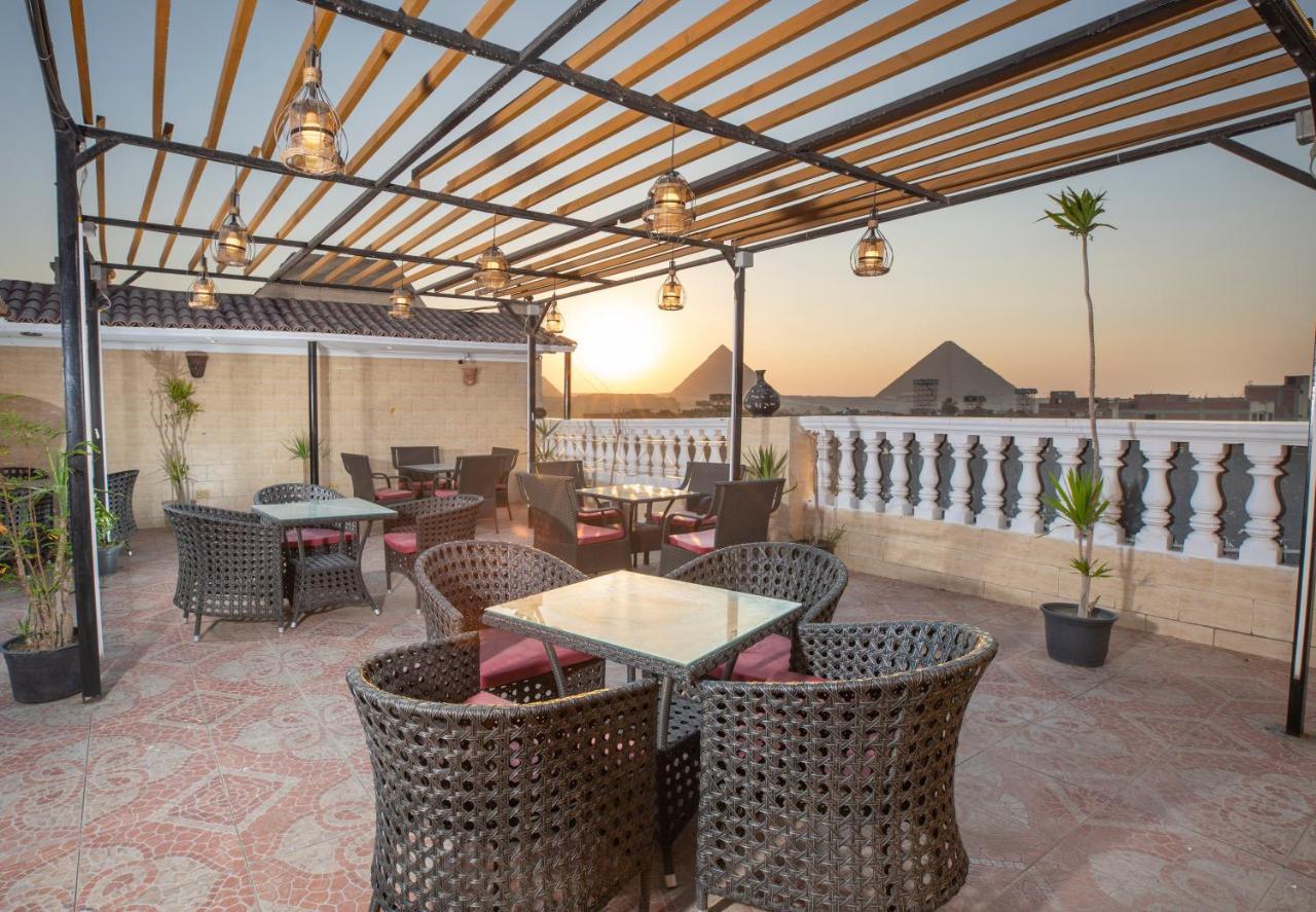 Pyramids Inn Hotel Kafret el-Gabal Esterno foto