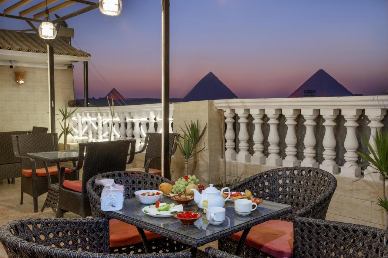 Pyramids Inn Hotel Kafret el-Gabal Esterno foto