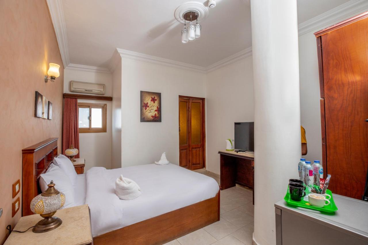 Pyramids Inn Hotel Kafret el-Gabal Esterno foto