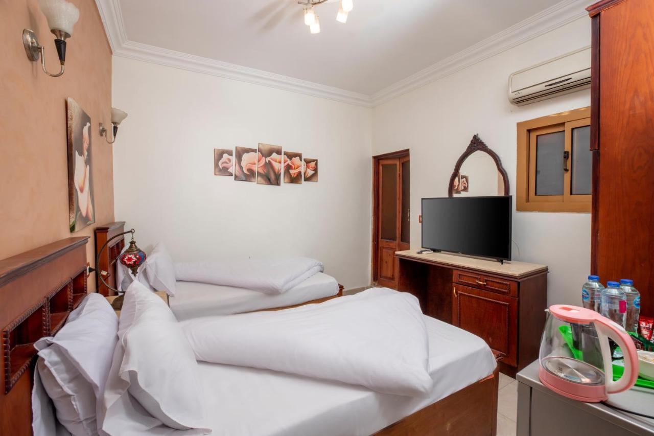 Pyramids Inn Hotel Kafret el-Gabal Esterno foto