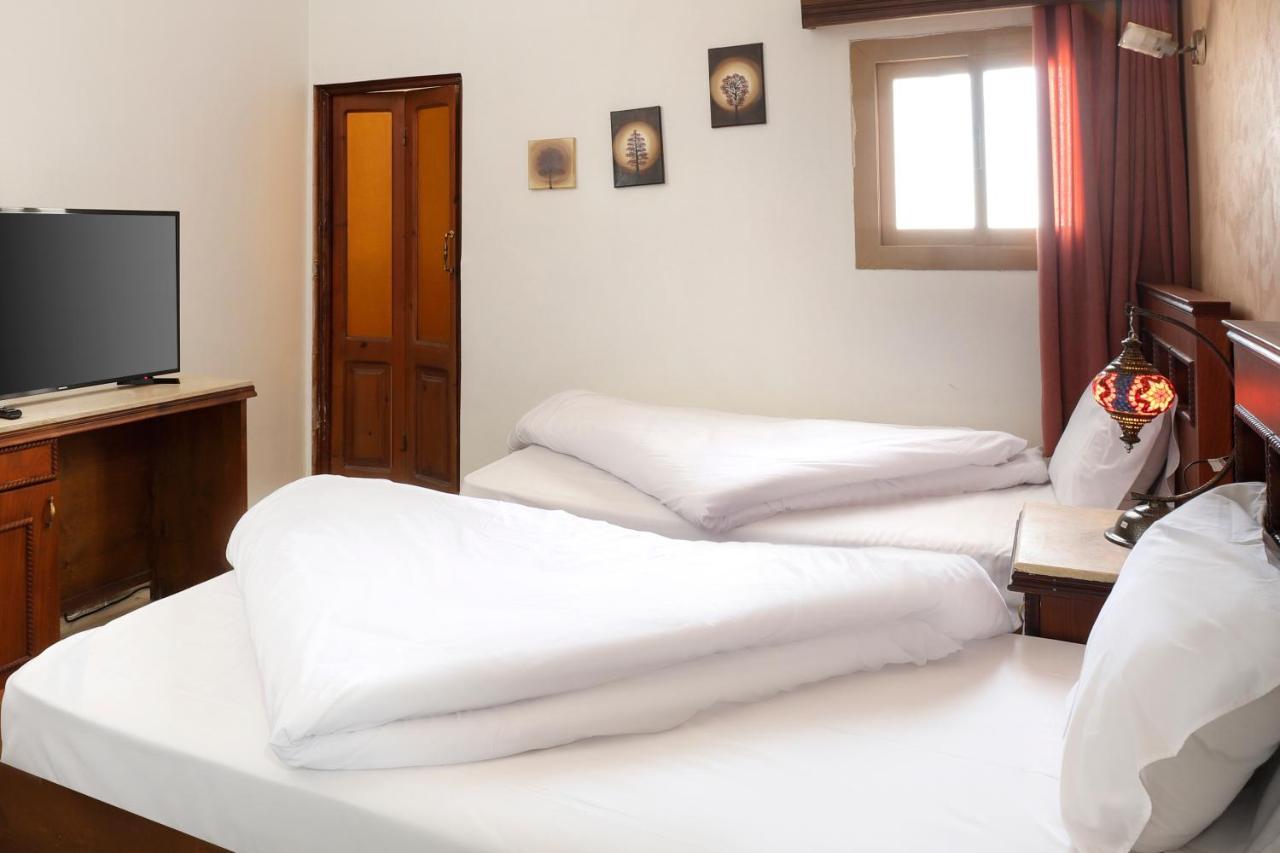 Pyramids Inn Hotel Kafret el-Gabal Esterno foto